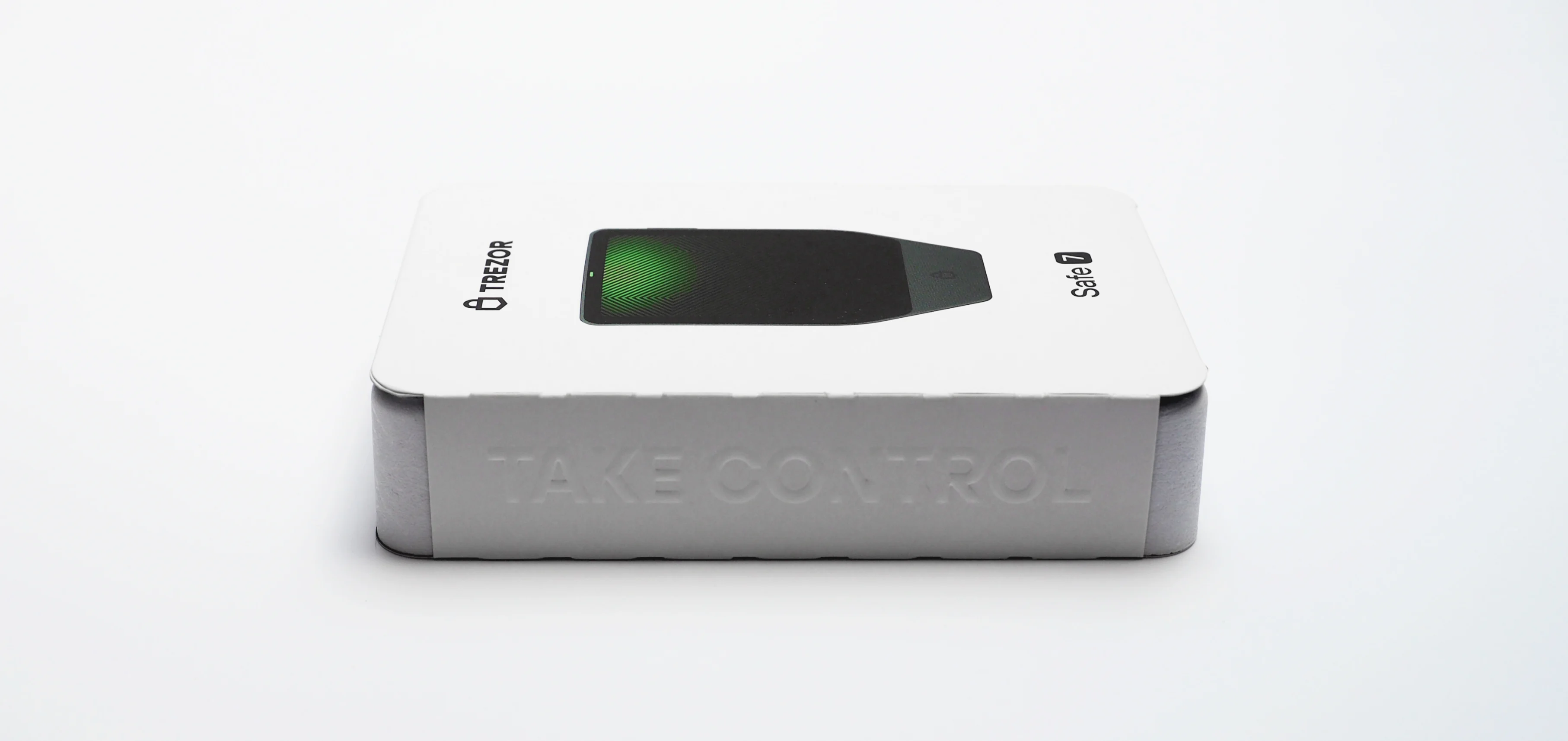 The closed Safe 7 box — a white lid with a device window, the aluminium base embossed “Take control”.