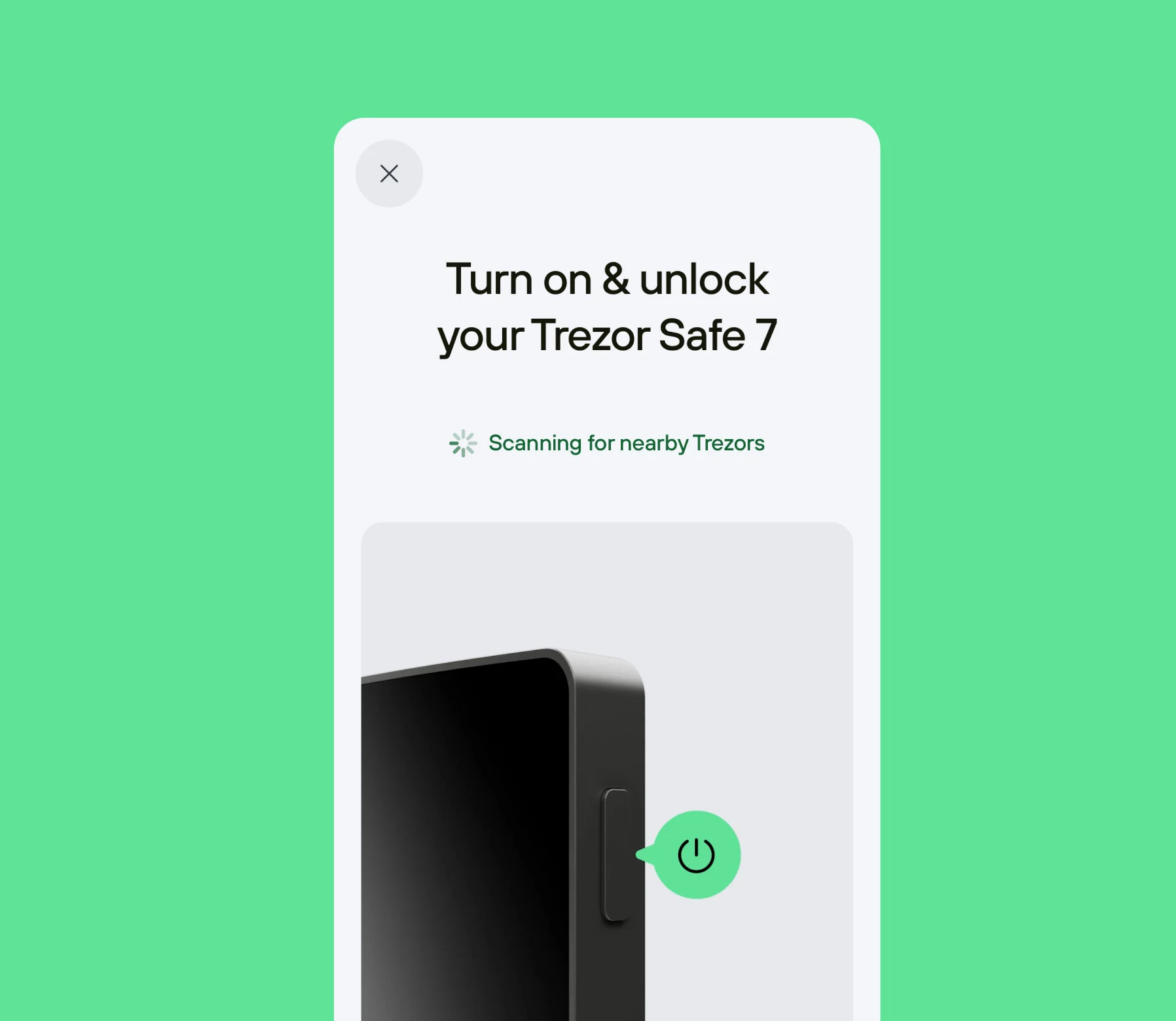 The Trezor Suite onboarding card on a green field — “Turn on & unlock your Trezor Safe 7”, scanning for nearby devices.